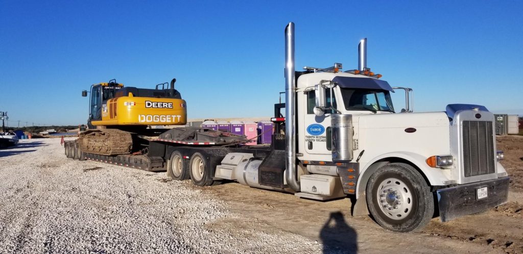 This image has an empty alt attribute; its file name is EQ-haul-track-hoe-1024x498.jpeg